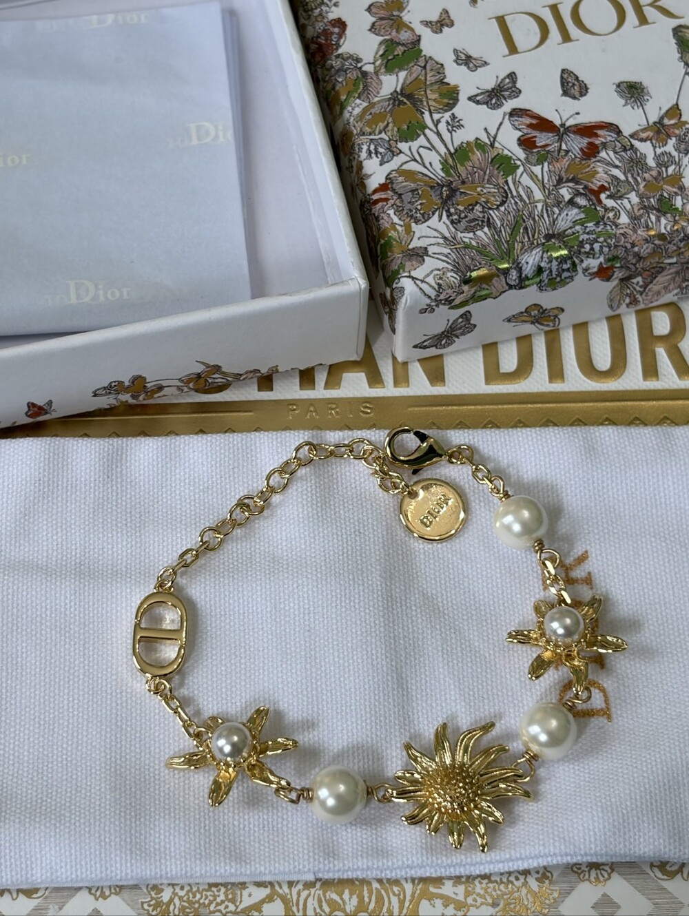 Dior Gold-Tone Sunflower Charm Bracelet with Pearl Accents